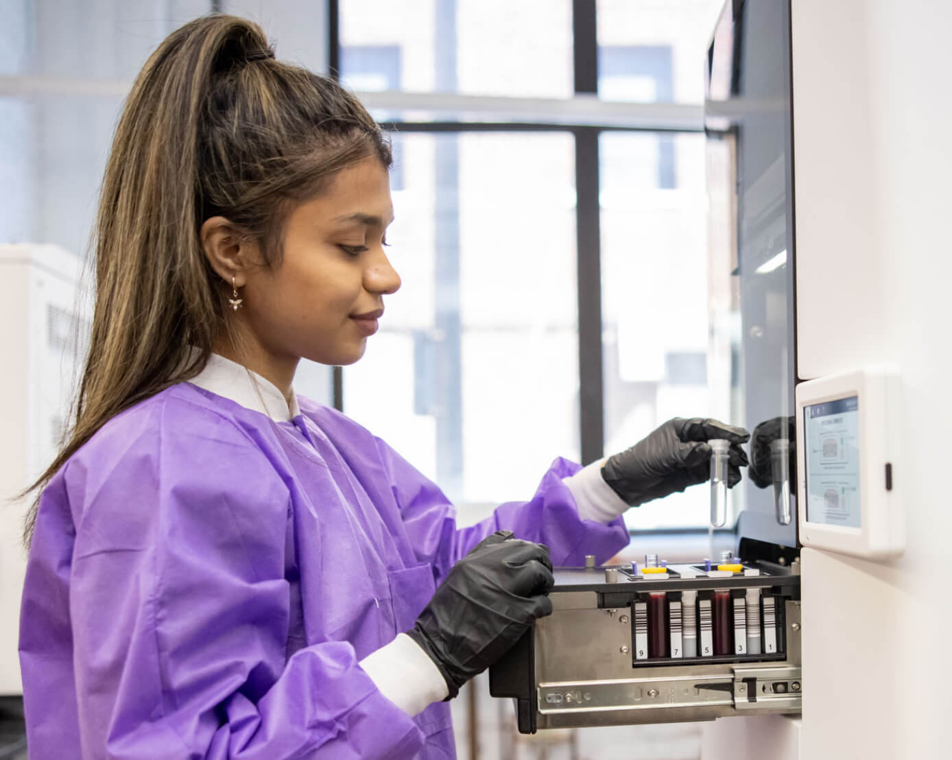 A Selux worker in the lab